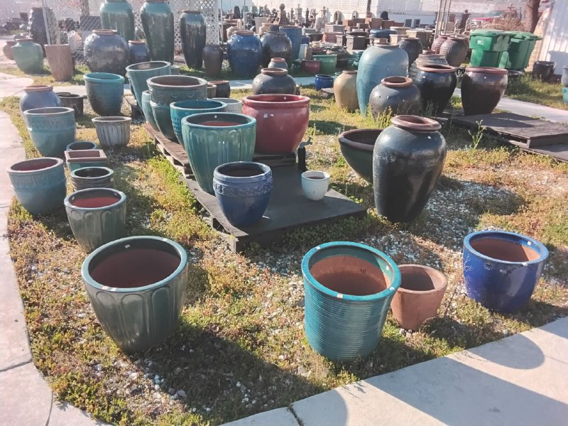 Green and blue ceramic garden pots